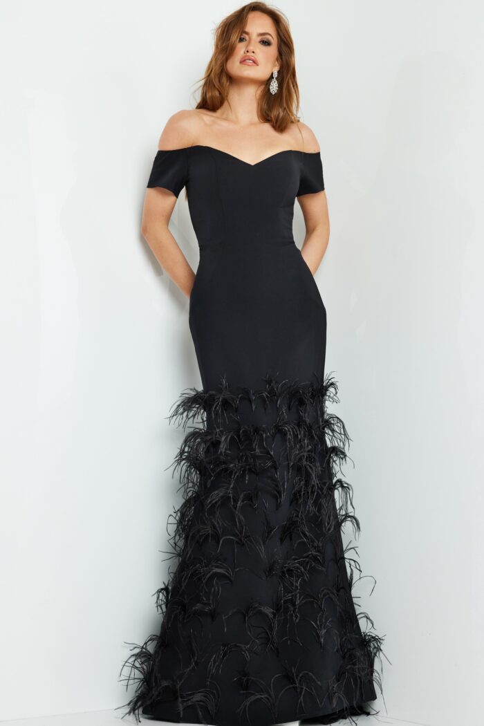Model wearing Black Mermaid Dress with Feathers on Skirt