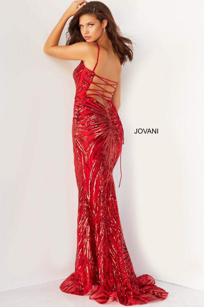 Model wearing Jovani 08481 Red Embellished Tie Back Dress