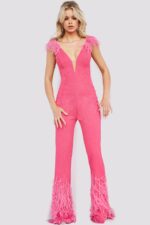 Model in Jovani 08554 full-length pink jumpsuit with feather detailing.