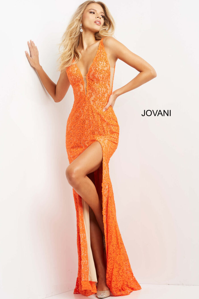 Model wearing Jovani 08674 Orange Nude Plunging Neck Lace Dress