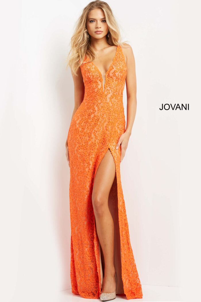 Model wearing Jovani 08674 Orange Nude Plunging Neck Lace Dress