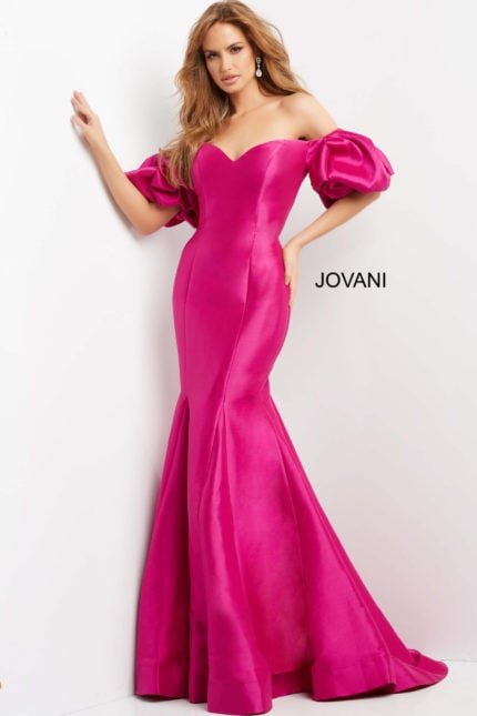 Model wearing Jovani 09031 pink off-the-shoulder gown with a sweetheart neckline and mermaid silhouette.