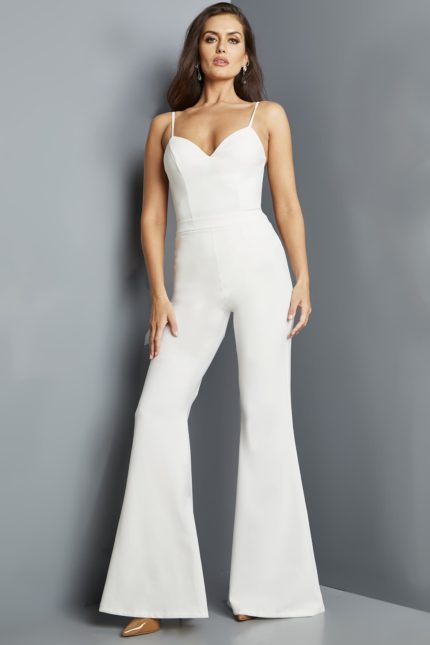 Model in Jovani 09381 ivory jumpsuit, front view without jacket.