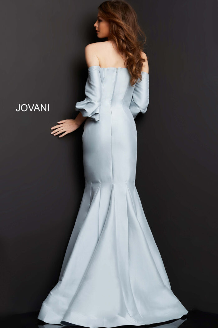 Model wearing Jovani 09420 Blue Three Quarter Sleeve Mermaid Evening Dress