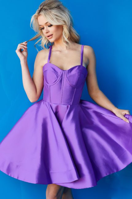 Model wearing Jovani 09464 purple cocktail dress with sweetheart neckline.