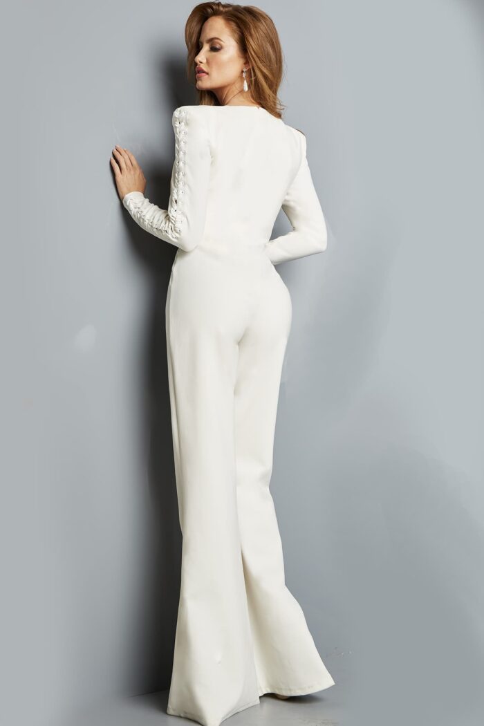 Model wearing Jovani 09588 White Long Sleeve Square Neckline Jumpsuit