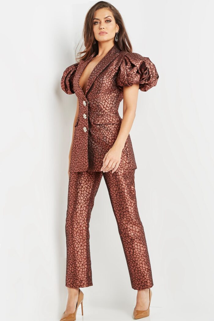 Model wearing Jovani 09643 Coffee Short Puff Sleeves Two Piece Suit