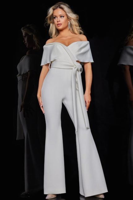 Model wearing Jovani 09726 white jumpsuit with off-the-shoulder neckline