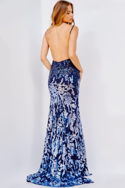 Back view of Jovani 09749 navy gown with open back and embroidered details.