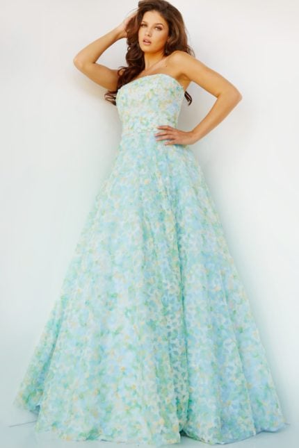 Model wearing K09765, full-length view of multi-colored A-line gown with strapless neckline.