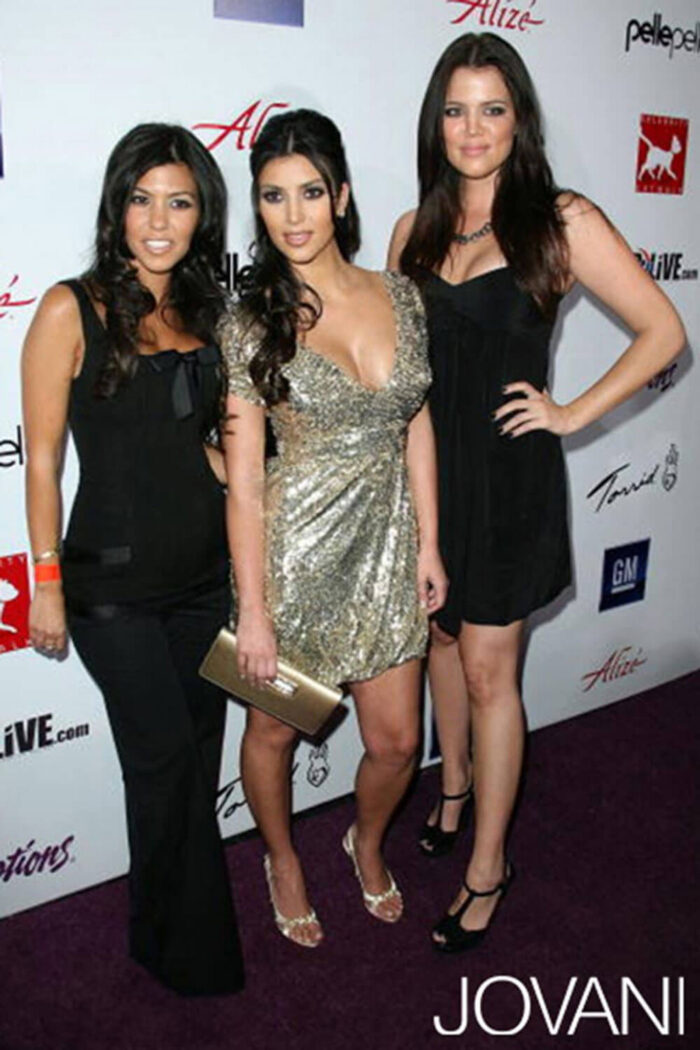 Model wearing Kim Kardashian in Vintage Gold Short Jovani Dress