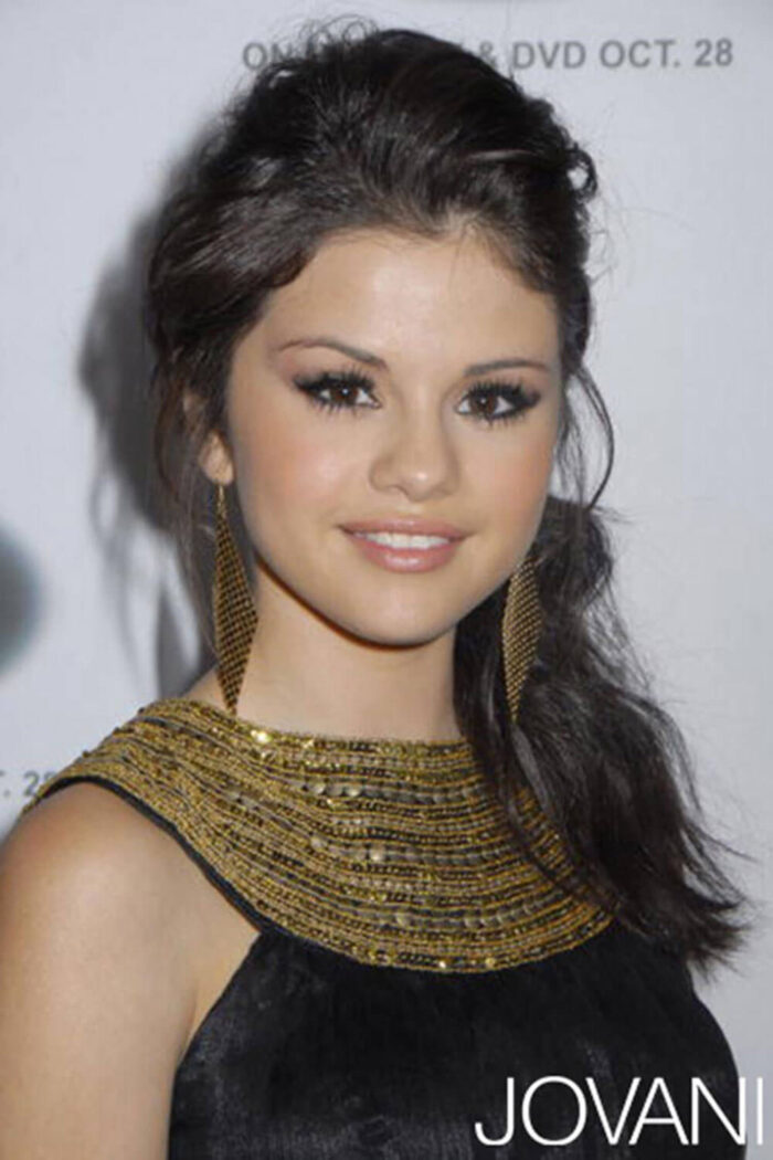 Model wearing Selena Gomez Gold Dress