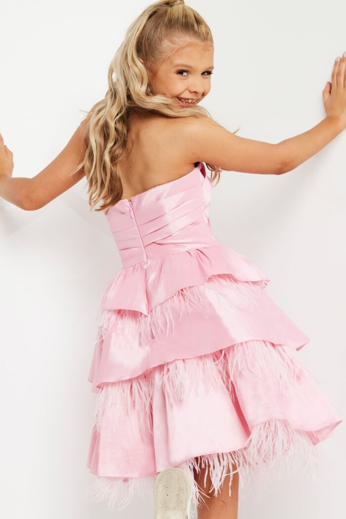 Model wearing Jovani K22326 Pink Fit and Flare Ruffle Skirt Kids Dress