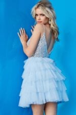 Model showing the back of Jovani 22604 light blue dress with a sparkling top.