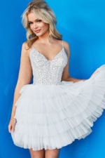 Model wearing Jovani 22604 white version with sparkling embellished bodice.