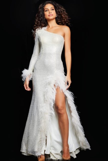 Model wearing Jovani 22895 beige dress with feather detail and high slit.