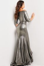 Model wearing Jovani 23136 silver dress, back view showing mermaid silhouette and off-shoulder design.