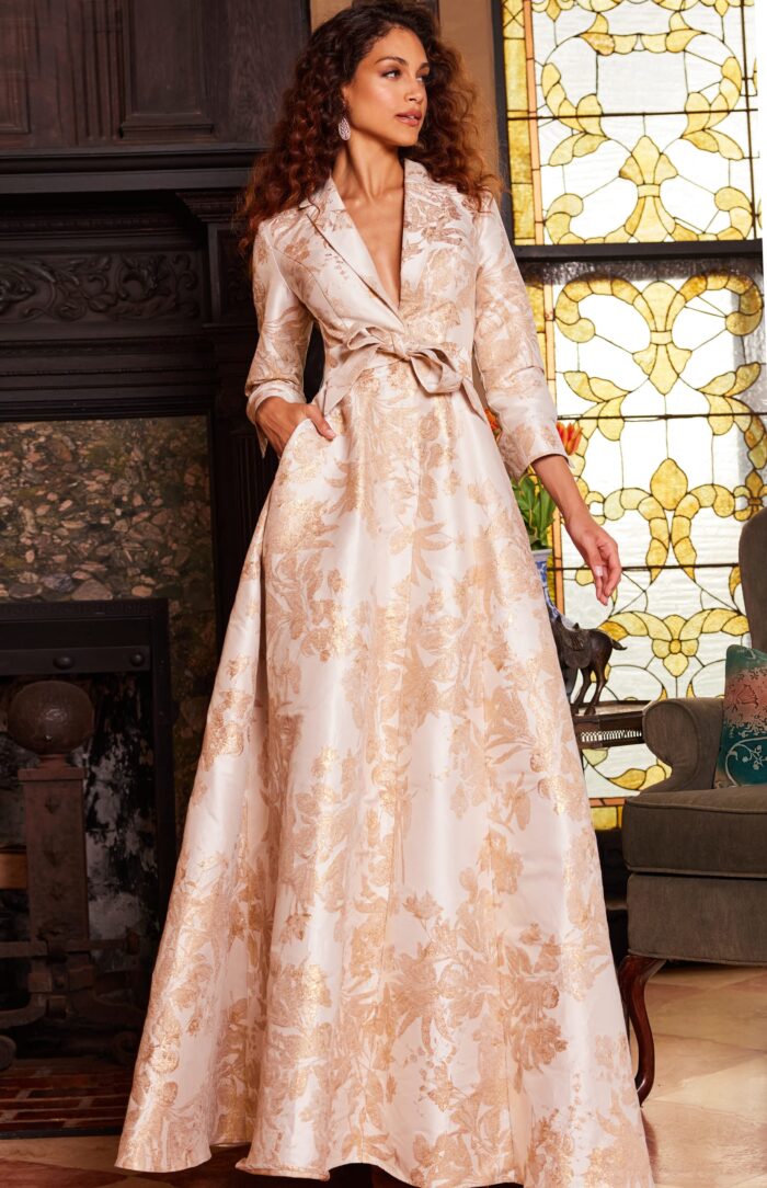 Model wearing Jovani 23178 Gold Long Sleeve V Neck Evening Gown