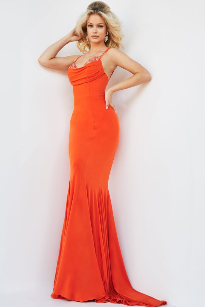Model wearing Jovani 23201 Orange Fitted Spaghetti Strap Dress