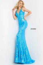 Model wearing Jovani 3263 turquoise mermaid dress with shimmering pattern