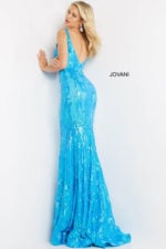 model wearing Jovani 3263 dress in turquoise back view