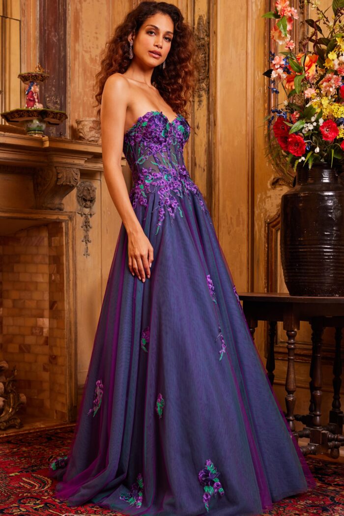 Model wearing Jovani 23578 Purple Multi Strapless Embroidered Gown
