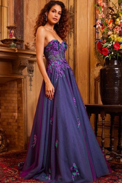 Model wearing Jovani 23578 in purple side angle showcasing floral details