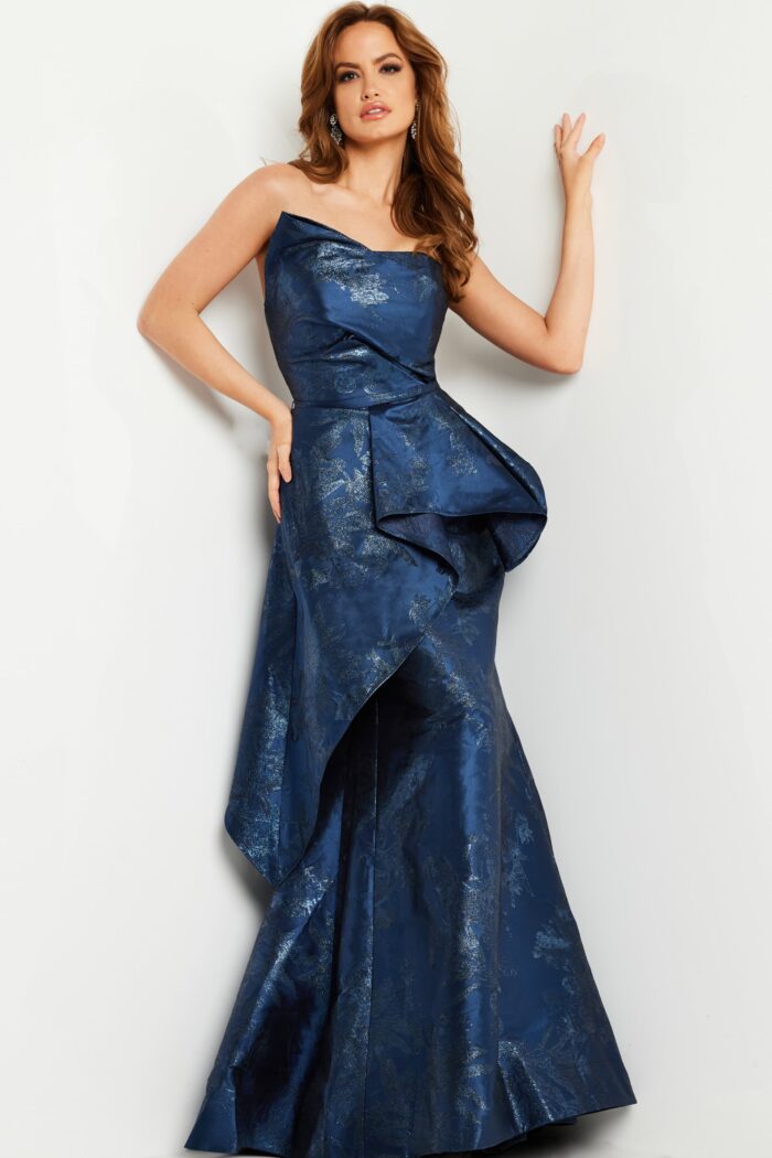 Model wearing Navy Peplum Mermaid Gown 23624