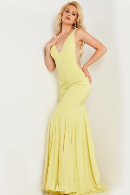 Model wearing Jovani 23701 yellow dress back view