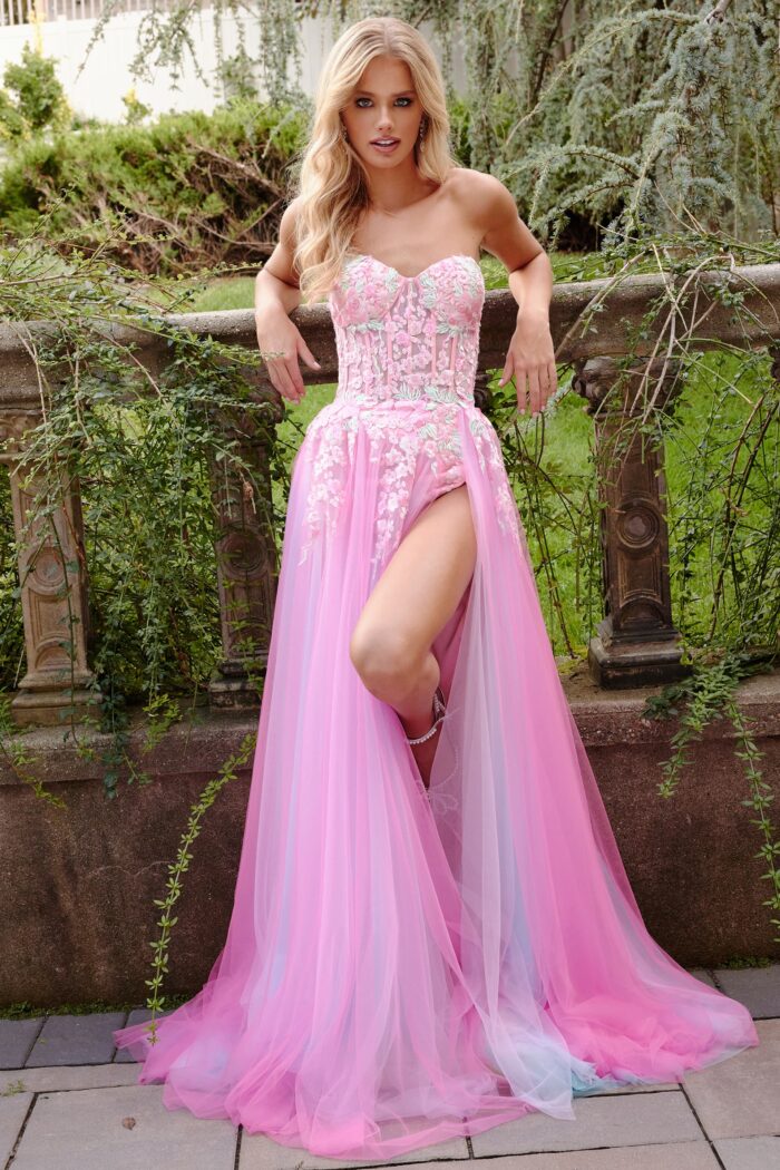 Model wearing Jovani 23713 Pink Multi Strapless Embellished A Line Gown