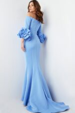 Back view of model wearing Jovani 23716 light blue gown, showcasing fitted silhouette