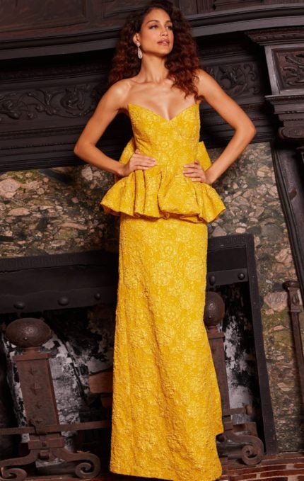 Model wearing Jovani 23849 yellow gown with sweetheart neckline and peplum detail.