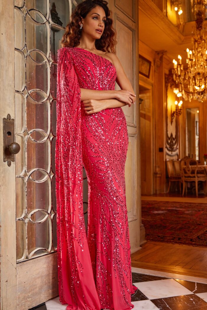 Model wearing Jovani 23887 Watermelon Embellished One Shoulder Evening Dress