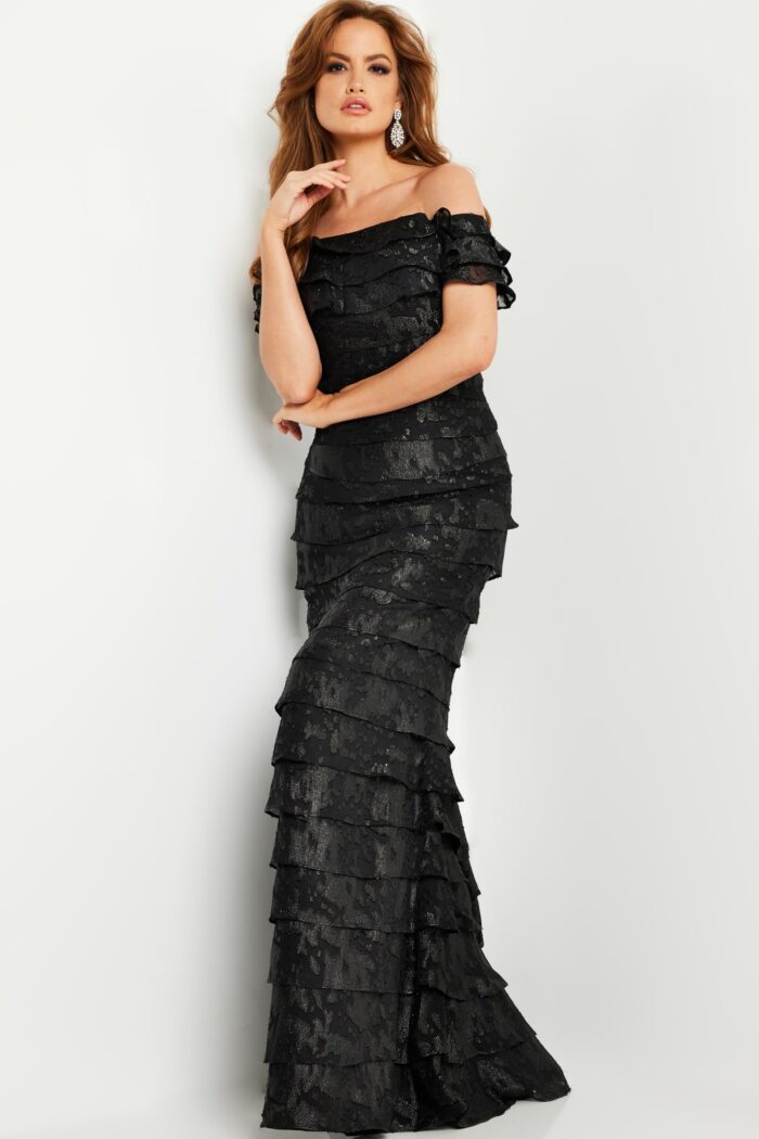 Model wearing Jovani 23890 Black Off the Shoulder Sheath Evening Dress