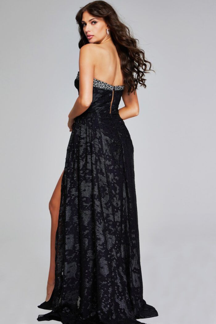 Model wearing Elegant Black Strapless Gown with Embellished Bodice and Side Slit 23892