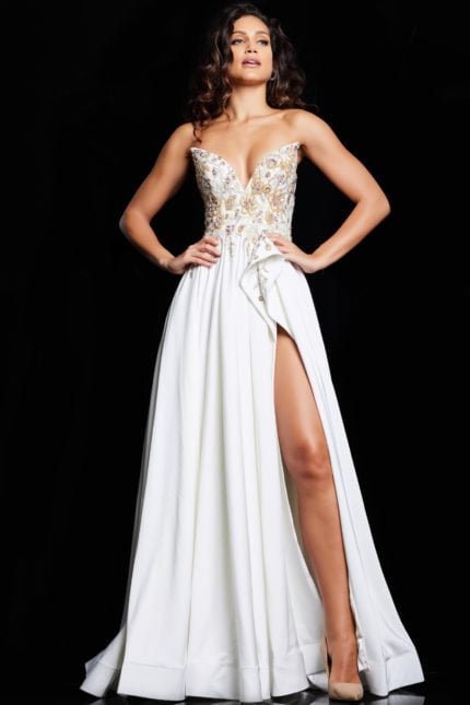 Model wearing Jovani 23937 white gown with sweetheart neckline and high slit, front view.