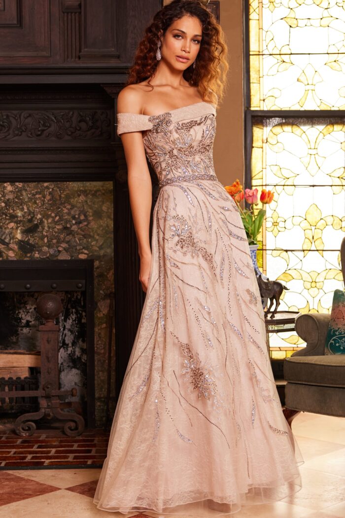 Model wearing Jovani 24055 Cream Embellished Off the Shoulder Evening Dress