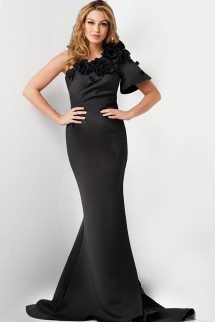 Model wearing Jovani 24279 black dress with asymmetrical floral design