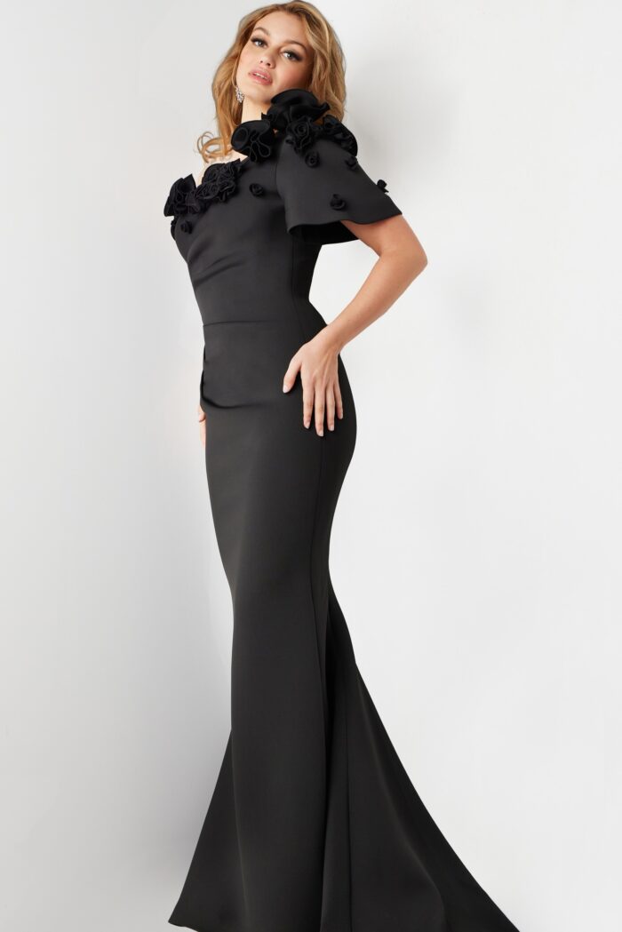 Model wearing Jovani 24279 Black One Shoulder Short Sleeve Evening Gown