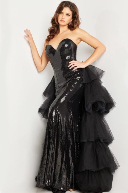 Model wearing Jovani 24554 black sequin dress with sweetheart neckline.