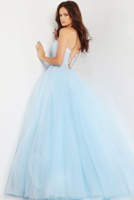 model wearing Jovani 25991 showcasing the lace-up back of the blue ball gown.