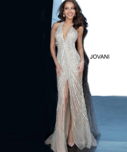 Model wearing Jovani 2609 nude dress with high slit, front view.