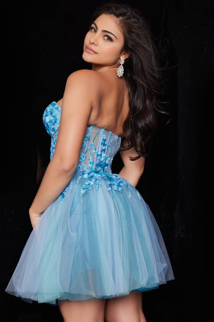 Model wearing Jovani 26094 Blue Multi Fit and Flare Strapless Dress