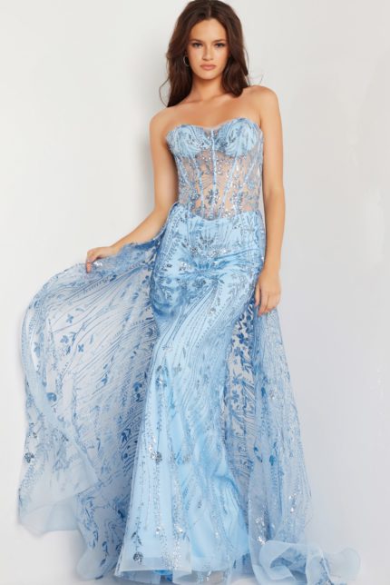 Model wearing Jovani 26113 blue dress with sheer bodice and sequin details, front view.