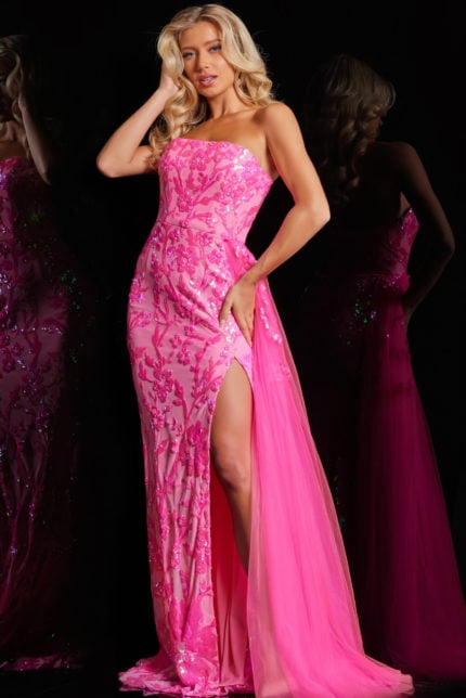 Model wearing Jovani 26134 pink dress highlighting fitted bodice and floral design.