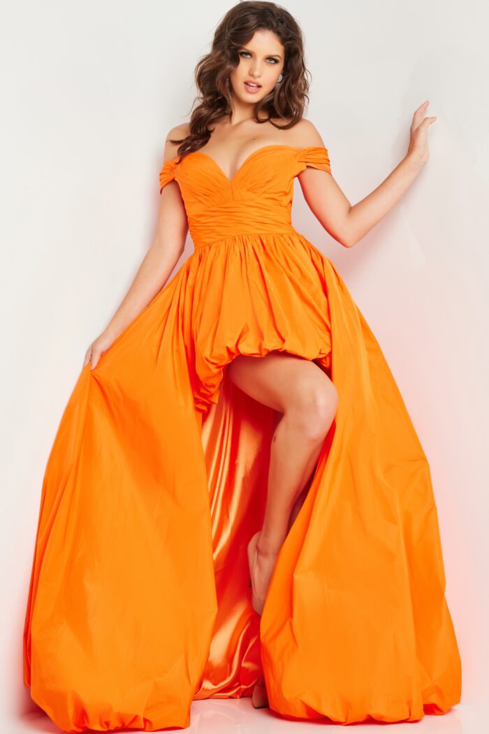 Model wearing Jovani 27804 Orange High Low Pleated Gown
