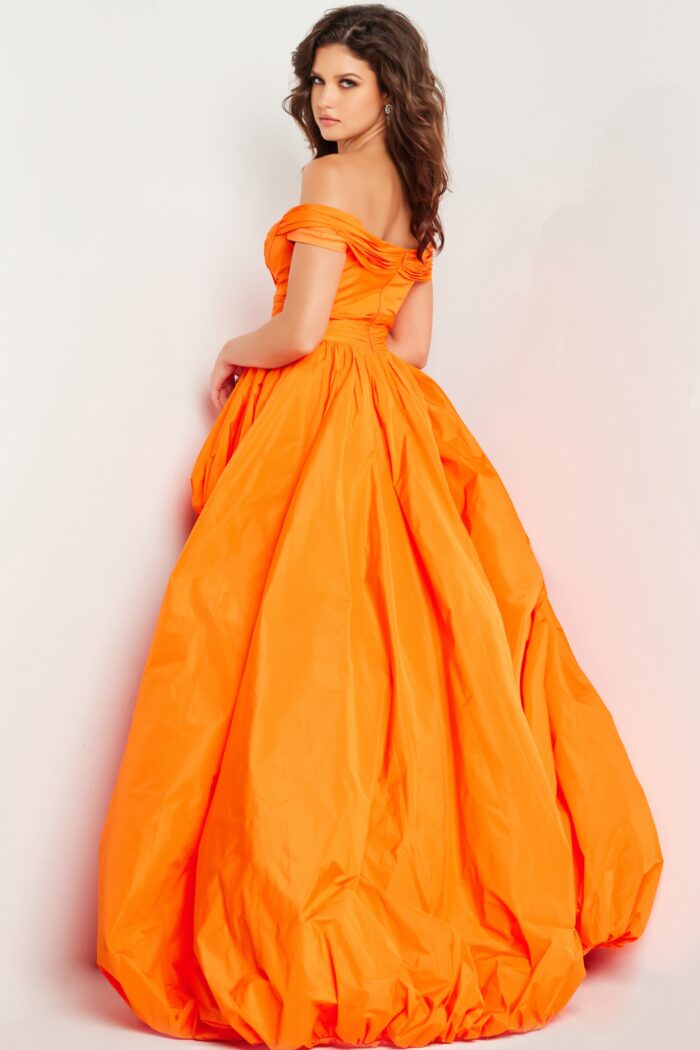 Model wearing Jovani 27804 Orange High Low Pleated Gown