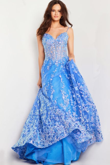 Model in blue Jovani 29072 dress with floral embroidery, front view