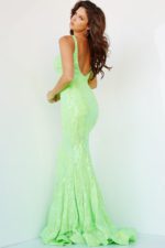 model wearing Jovani 3263 dress in neon green back view