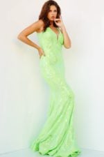 model wearing Jovani 3263 dress in green side view